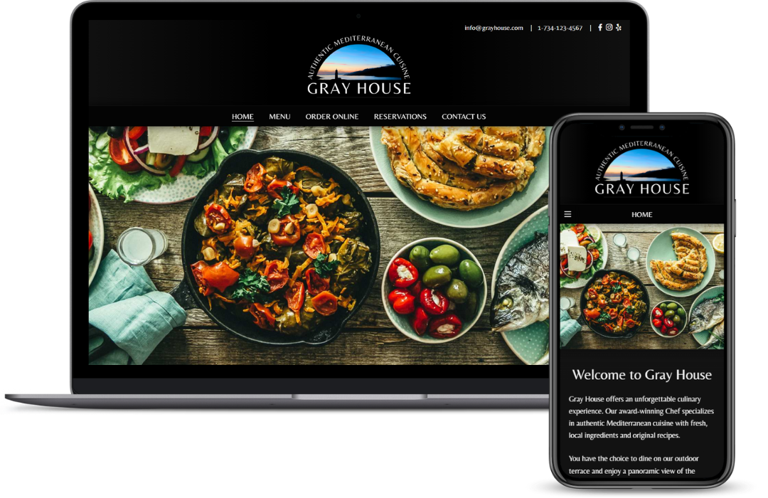 3D phone and laptop models displaying Gray House Restaurant website made by Lawson Web Development